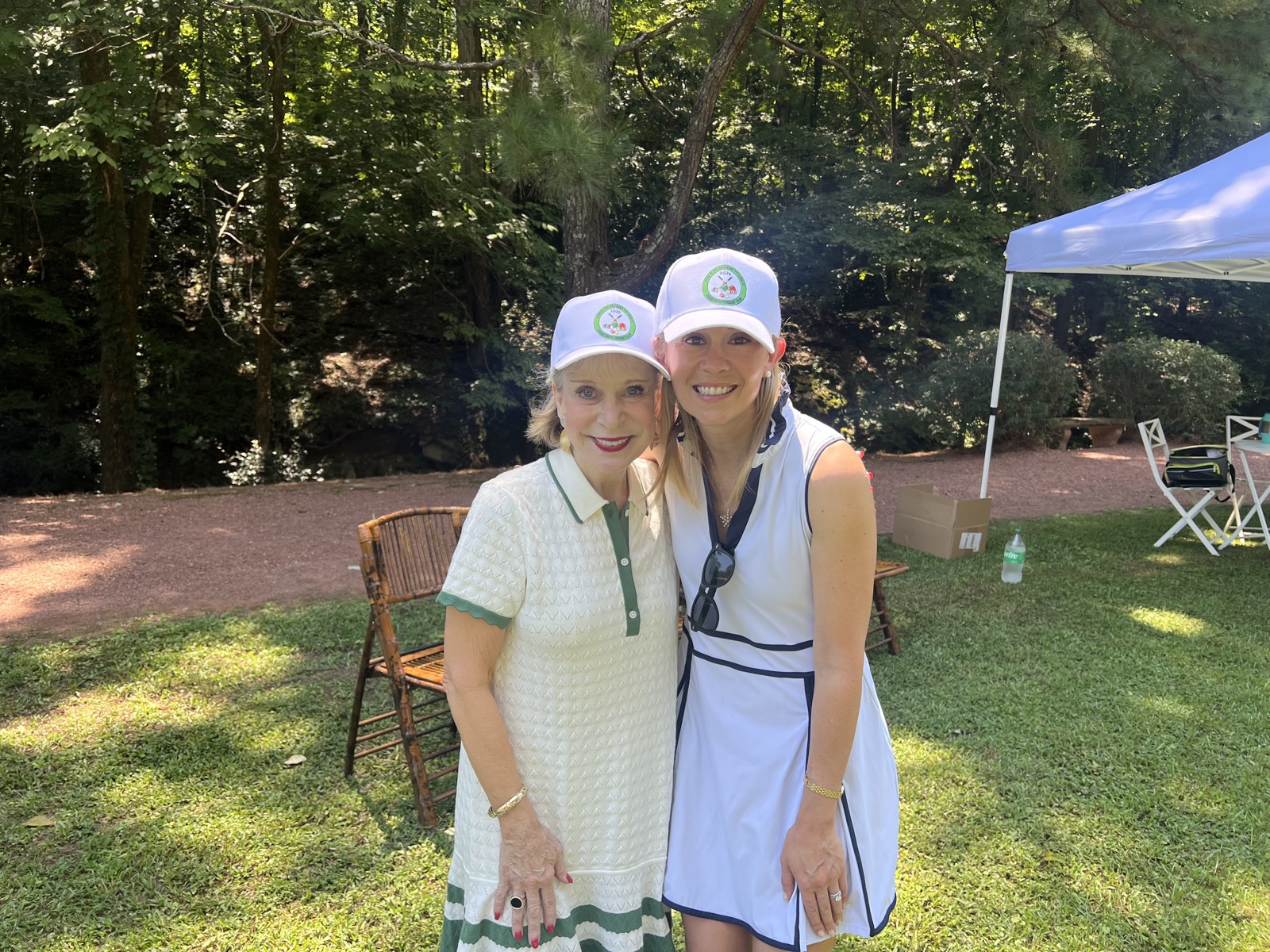Mary McSpadden and Mayor Graham Smith in club caps at the Cross Creek croquet party